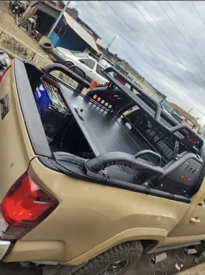 Toyota Tacoma Manual Rolling Booth Cover and Iron Bar Available