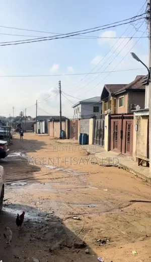 Level Dry Bare Land in Abule Egba for Sale