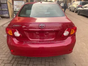 Toyota Corolla LE 4dr Sedan (1.8L 4 cyl 4A) 2009 Red