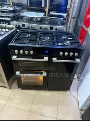 Range Cooker With Five Gas Burners and Multiple Oven Cavities.