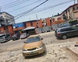 1200sqm (2plot of Land) Land With Demolishable Structure