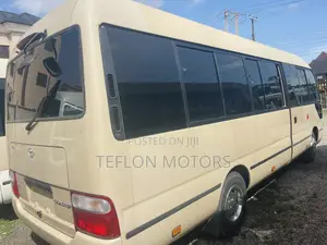Toyota Coaster 2018 Gold