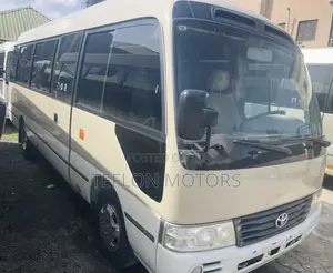 Toyota Coaster 2018 Gold