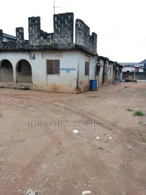 Land Decked House on Half Plot of Land With Good Proximity And
