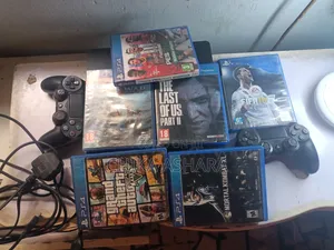 Playstation 4 Slim, 2pads And 6games