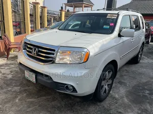 Honda Pilot Touring w/RES/Navi 4WD (3.5L 6cyl 5A) 2013 White