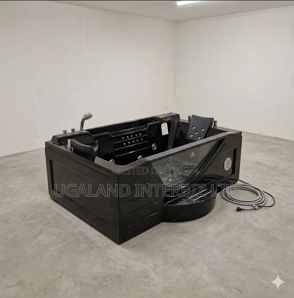 Executive Black Jacuzzi With Built in Step and Padded Headrest