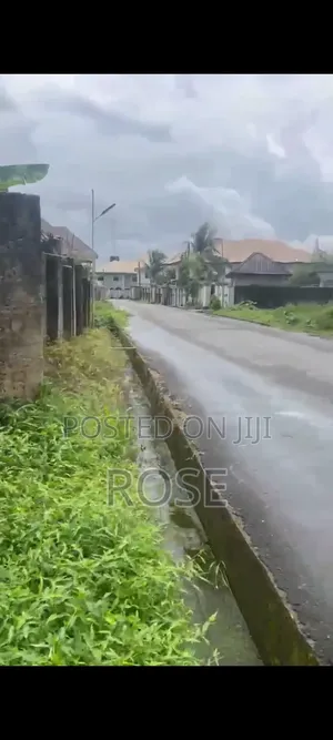 Land With Incomplete House