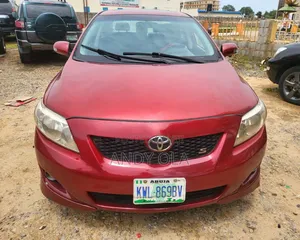 Toyota Corolla LE 4dr Sedan (1.8L 4 cyl 4A) 2009 Red
