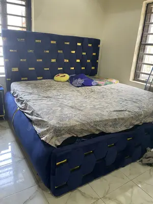 Bed Frame and 6 by 6 Mattress. Barely Used