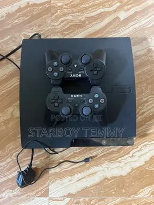Ps3 With Two Games and Two Pad