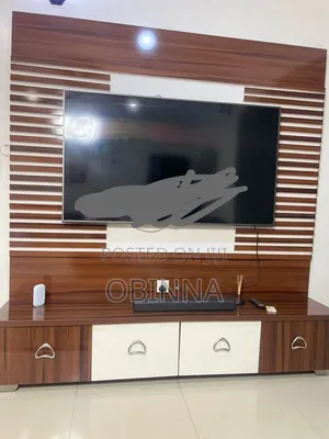 Brown Television Console With Cupboard