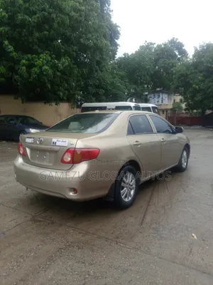 Toyota Corolla LE 4dr Sedan (1.8L 4 cyl 4A) 2009 Gold