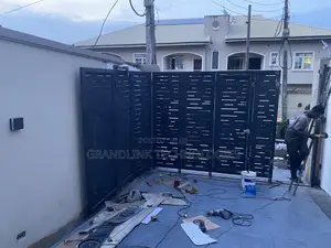 Sectional Sliding Gate Construction And Automation.