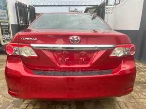 Toyota Corolla L 4dr Sedan (1.8L 4cyl 5M) 2013 Red