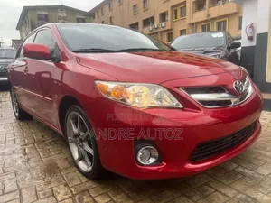 Toyota Corolla L 4dr Sedan (1.8L 4cyl 5M) 2013 Red