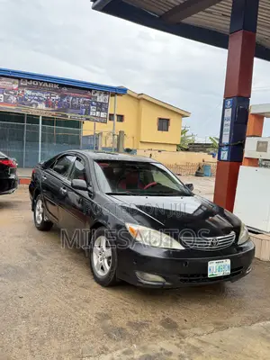 Toyota Camry SE V6 4dr Sedan (3.3L 6cyl 5A) 2004 Brown