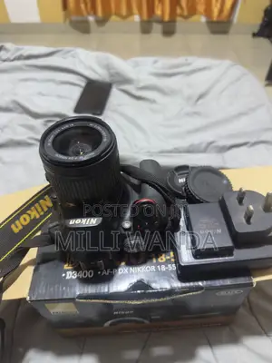 Nikon D3400 DSLR Camera With 15-55mm Kit Lens and Extra Battery