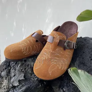 Cop the Embroidered Cowboy Clogs