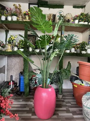 Artificial Plants, Vase and White Stone