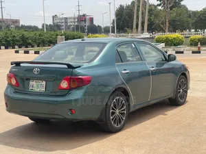 Toyota Corolla Base 4dr Sedan (1.8L 4cyl 5M) 2010 Green