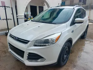 Ford Escape Titanium 4dr SUV AWD  (1.6L 4cyl Turbo 6A) 2014 White