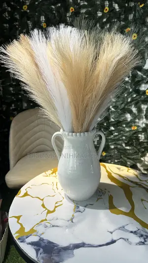 White Ceramic Vase With Pampas Grass