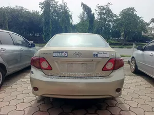 Toyota Corolla LE 4dr Sedan (1.8L 4cyl 4A) 2010 Gold