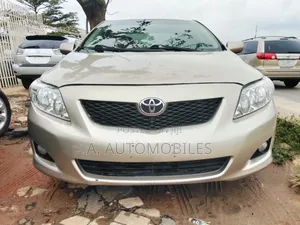 Toyota Corolla LE 4dr Sedan (1.8L 4cyl 4A) 2010 Gold