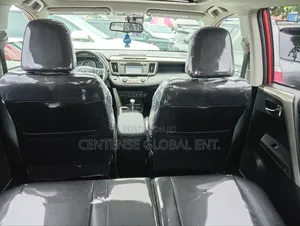 Toyota RAV4 Limited 4dr SUV (2.5L 4cyl 6A) 2014 Orange