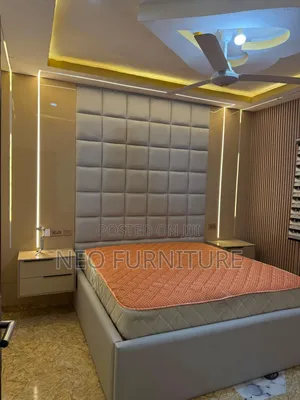 Bedframe With High Padded Headboard