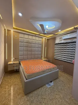 Bedframe With High Padded Headboard