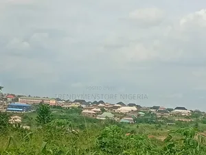 Distress Sale: Partially Fenced Half Plot Close to RCCG New Auditorium