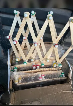 Expandable Accordion-Style Wooden Peg Racks.