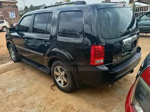 Honda Pilot Touring w/RES/Navi 4WD (3.5L 6cyl 5A) 2010 Black