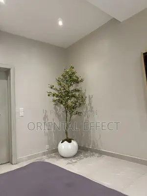 White Wobble Pot Styled With Artificial Osman Tree | Artificial Plant