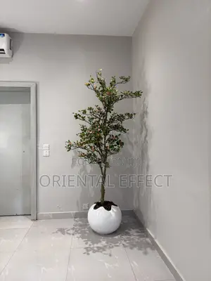 White Wobble Pot Styled With Artificial Osman Tree | Artificial Plant