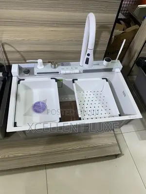White Automated Kitchen Sink With Chopping Board and Baskets