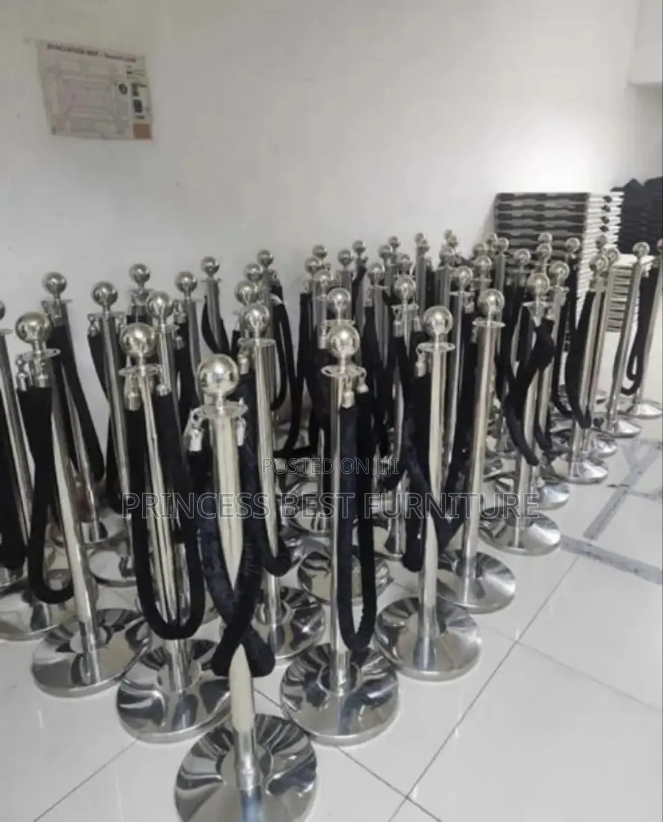 Silver Stand With Black Rope Barrier