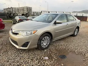 Toyota Camry LE 4dr Sedan (2.5L 4cyl 6A) 2013 Gold