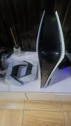 Clean Ps5 Slim With 10 Games Installed and Two Pads Avaliable