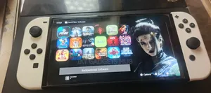 Working Used Nintendo Switch Oled With Games Installed