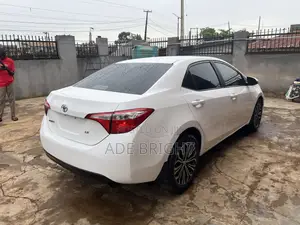 Toyota Corolla L 4dr Sedan (1.8L 4cyl 6M) 2015 White