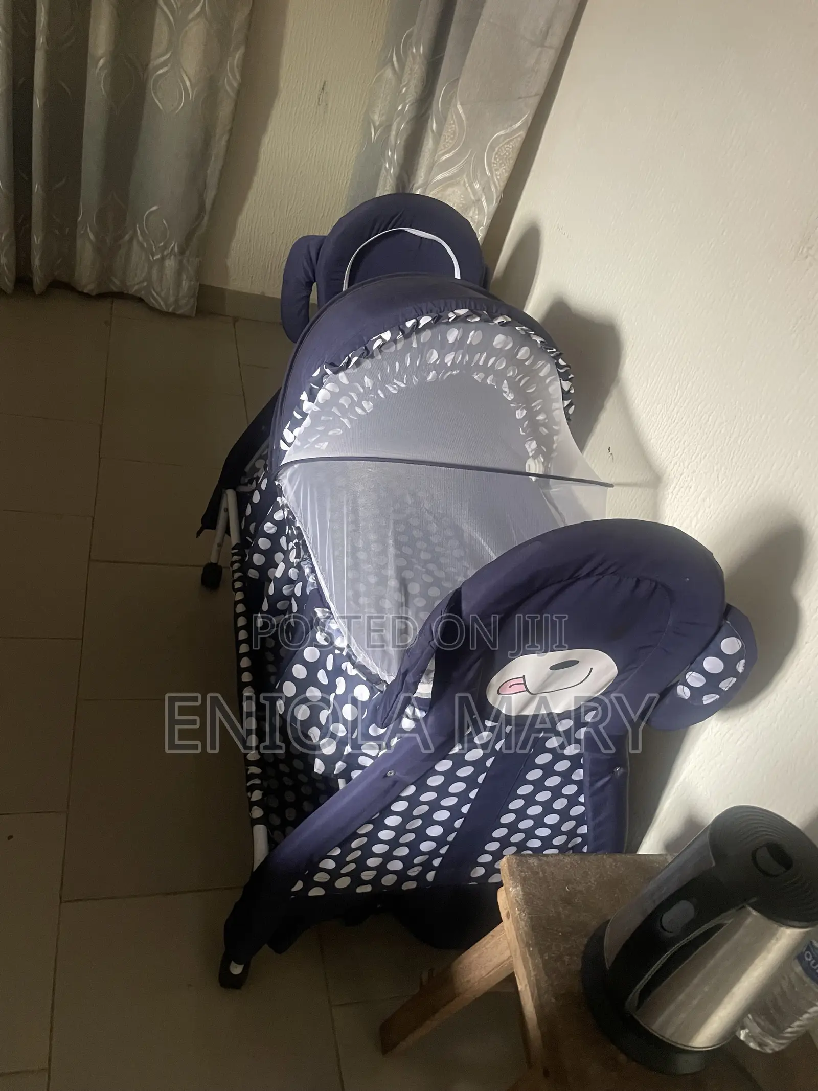 A Very Neatly Used Baby Cot