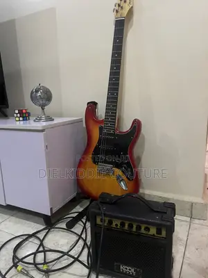 Fender Stratocaster Electric Lead Guitar, Amplifier, Bag And Cable