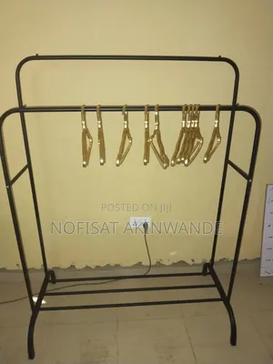 Black Aluminium Cloth Rack And Gold Hanger