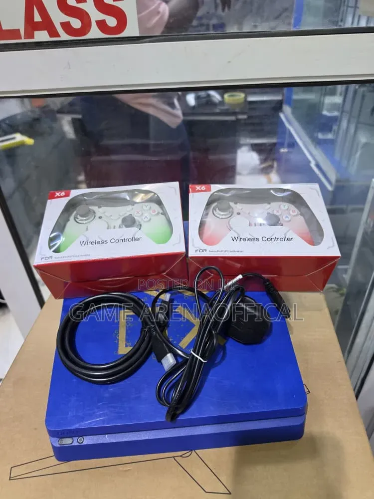 Uk Used Ps4 Slim Bundle – 2 Pads + Games