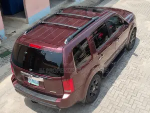 Honda Pilot Touring w/RES/Navi 4WD (3.5L 6cyl 5A) 2010 Burgundy