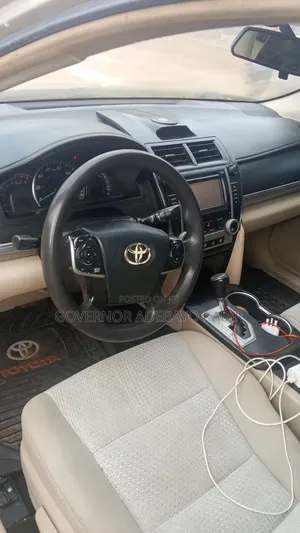 Toyota Camry LE 4dr Sedan (2.5L 4cyl 6A) 2012 Gold