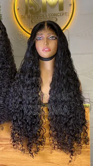 A 32 Inches Vietnamese Raw Loose Deep Wave Merged With 5x5 Closure